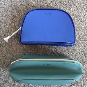 La Mer Vibrant Blue and Teal Cosmetic Bag Duo